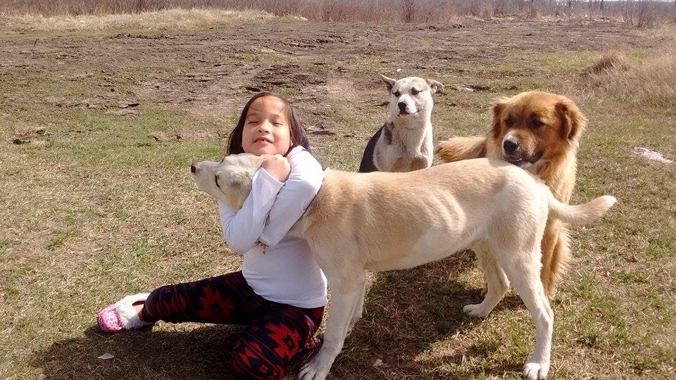 Who says dogs don't love hugs? / Submitted by family