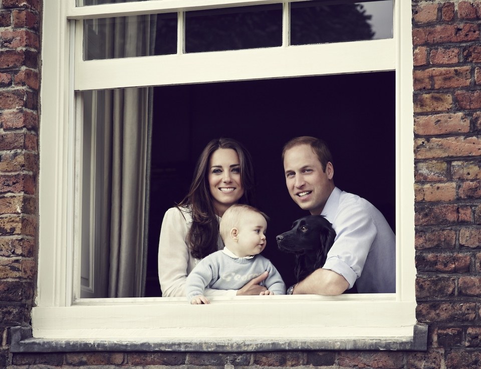Jason Bell captured this informal portrait of the young couple and 8-month-old George in 2014.