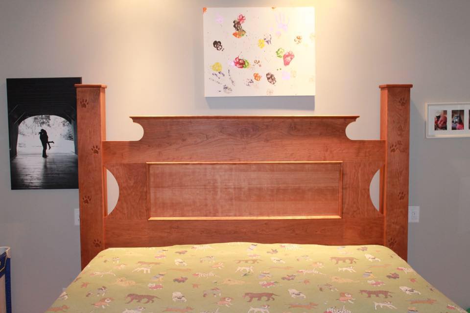 Paw prints carved into the custom bed/Facebook