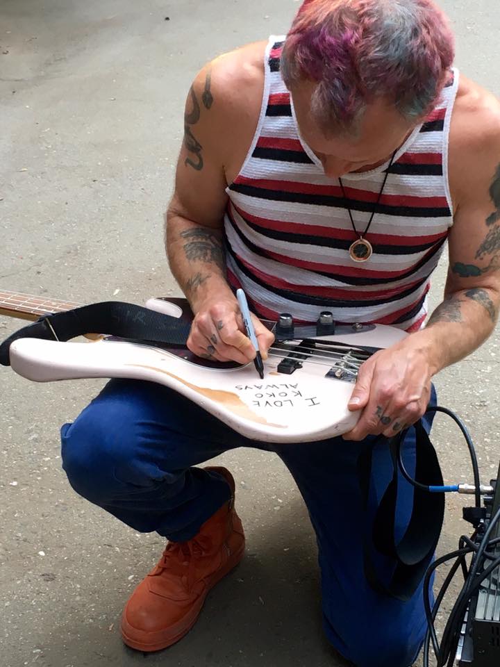 Flea also signed his guitar for Koko.